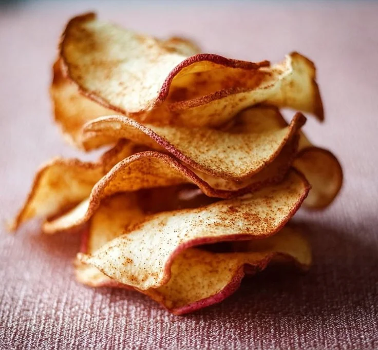 Healthy baked apple chips, crispy and delicious snack made from fresh apples