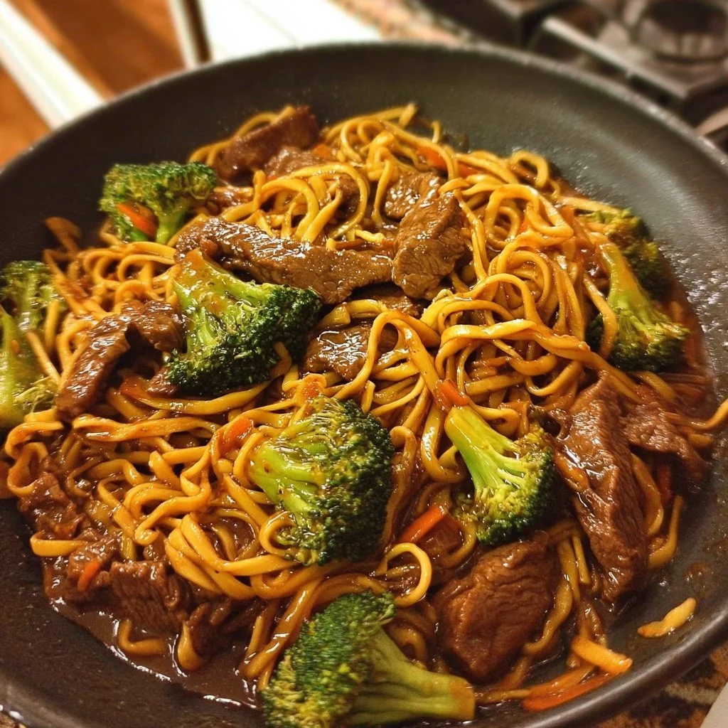 Delicious beef and broccoli noodles dish with tender beef and fresh vegetables.
