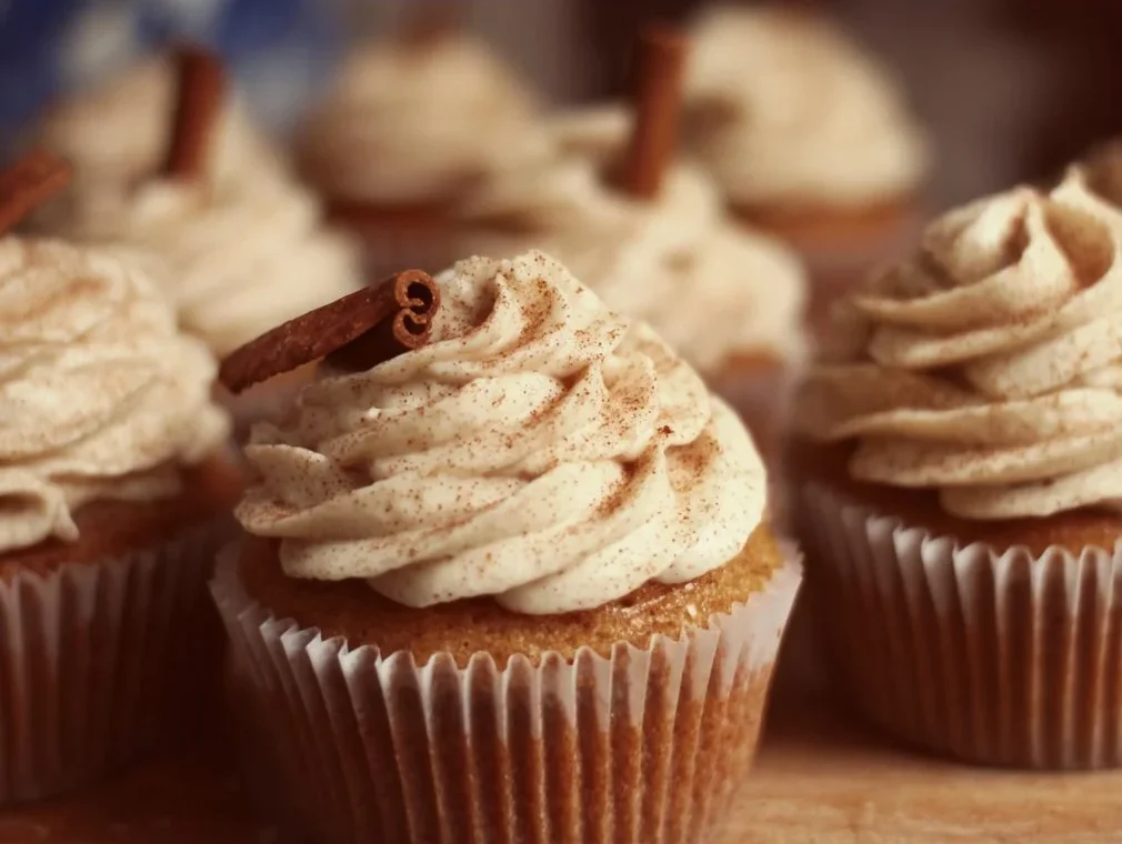 Delicious Chai Latte Cupcakes topped with frosting and spices