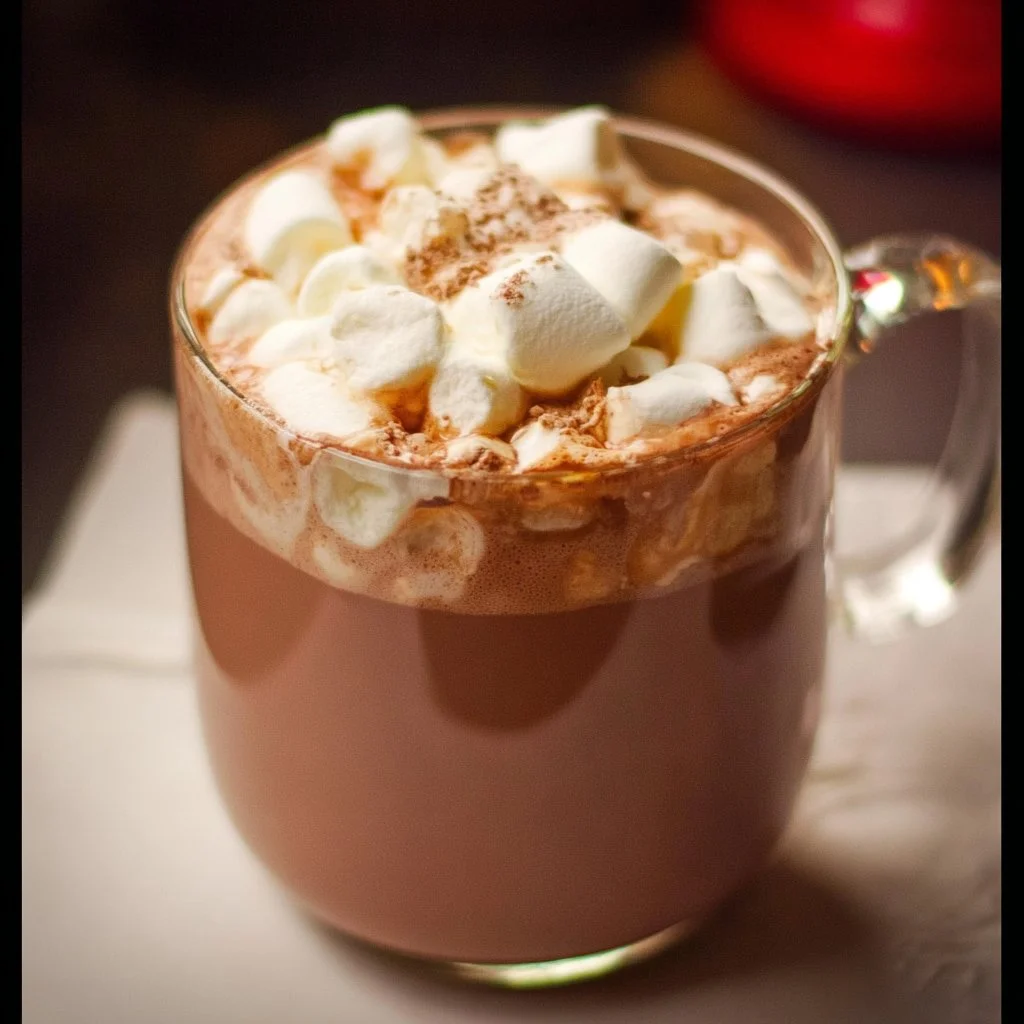 Delicious creamy Crockpot hot chocolate in a festive mug