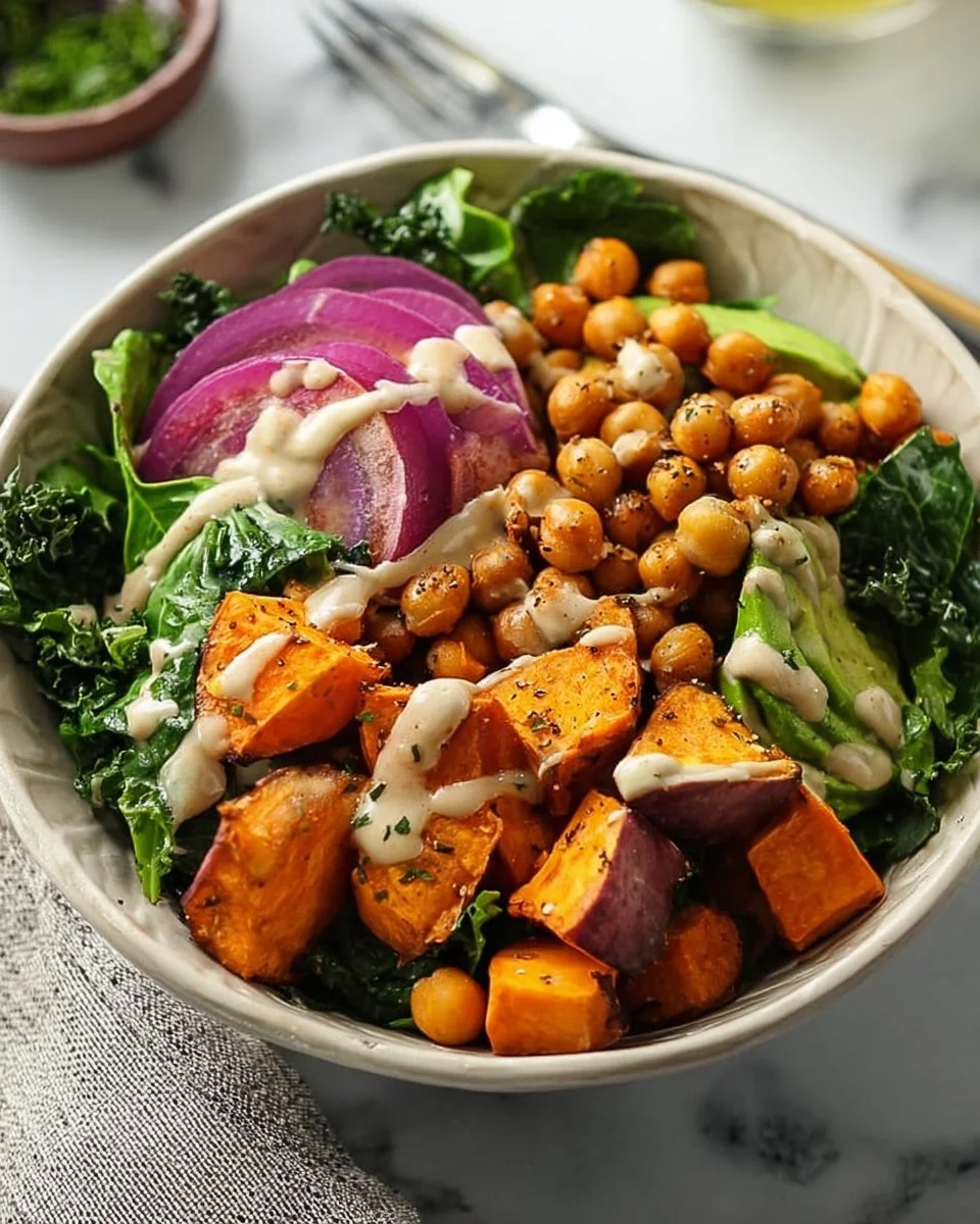 Healthy Sweet Potato Chickpea Buddha Bowl with fresh vegetables and toppings