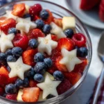 Easy 4th of July fruit salad with colorful summer fruits in a bowl